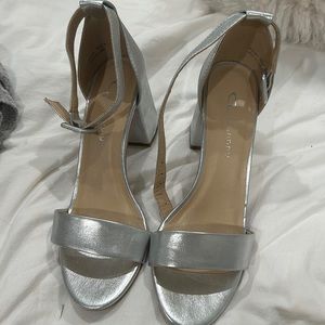 Never worn silver heels